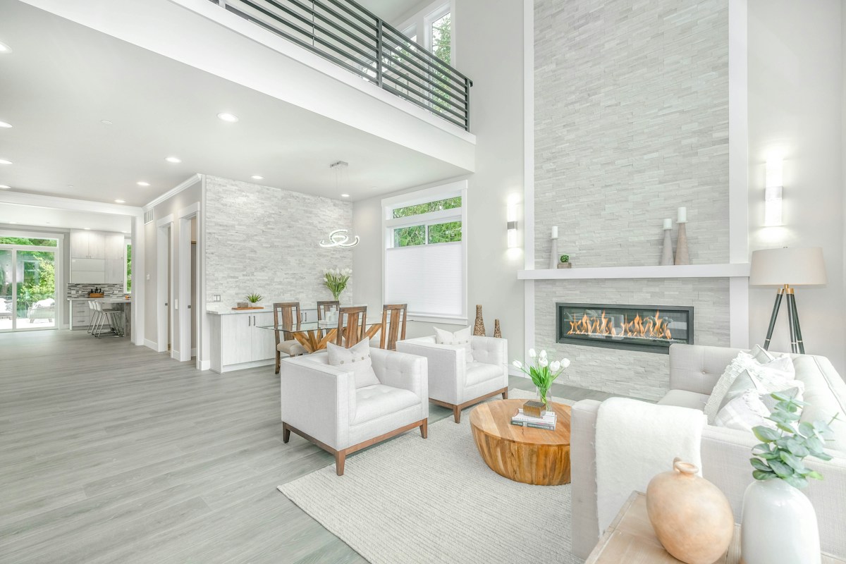 Spacious elegant living room with hardwood flooring. Reference photo by Zac Gudakov on Unsplash.